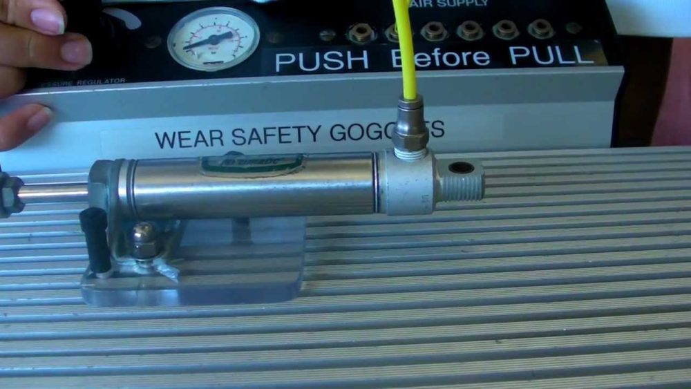Single-acting pneumatic cylinder application in an industrial system 